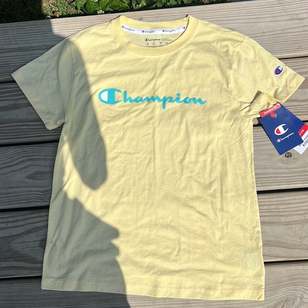 I’m selling a yellow and teal champion shirt